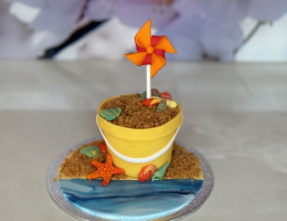 Mini beach bucket cake with pinwheel